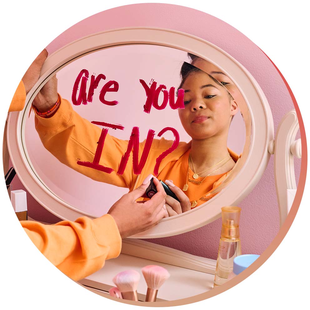Person living with sickle cell disease writing "Are
    you in?" on a mirror